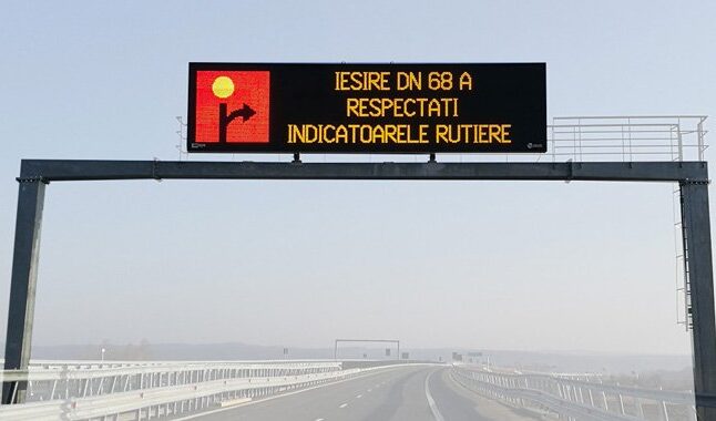LED traffic guidance screen on highway displaying electronic message for road safety