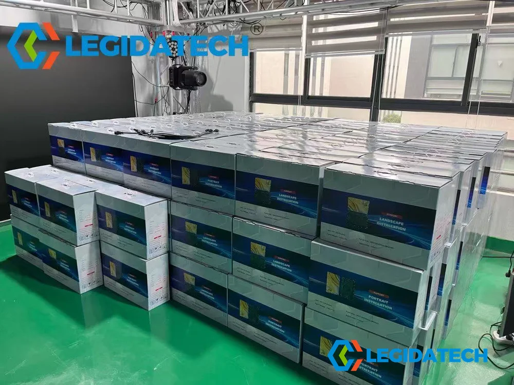 Stacked color box packaging for Ehonor 480x320mm indoor LED screen cabinets ready for consolidation into export crates at LEGIDATECH