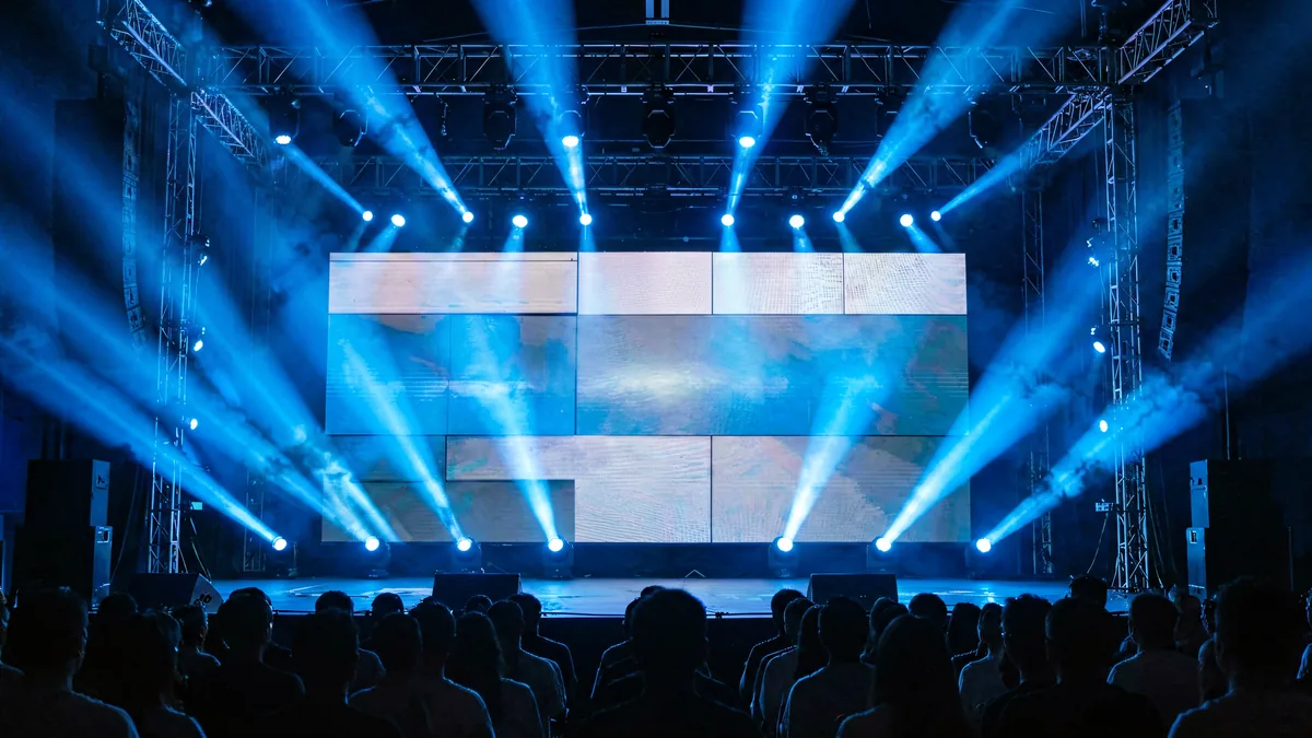 Rental LED stage screen behind a live concert stage