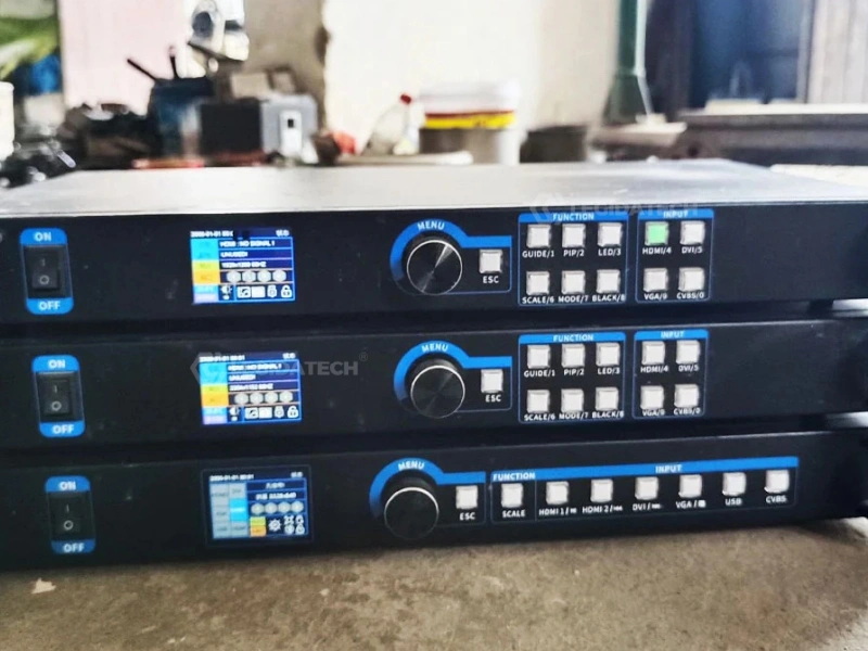 Mooncell MVB4S Pro LED video processor installed in control rack with Ethernet cables connected to LED display receiving cards for complete system setup