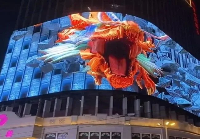 Dragon 3D animation on a naked eye 3D LED display for media company advertising