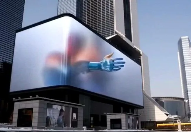 Outdoor 3D LED billboard installed in a downtown commercial area