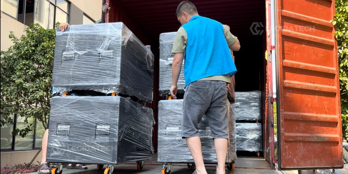 Loading AF1000 500x1000mm rental LED display flight cases into a truck for a festival tour
