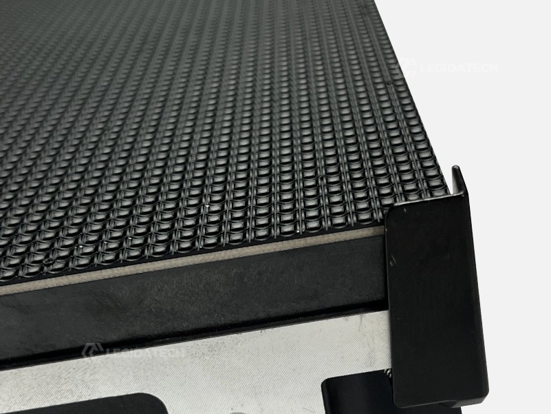 Close-up of the AF1000 protective corner guard and bottom anti-collision bump on a 500x1000mm rental cabinet