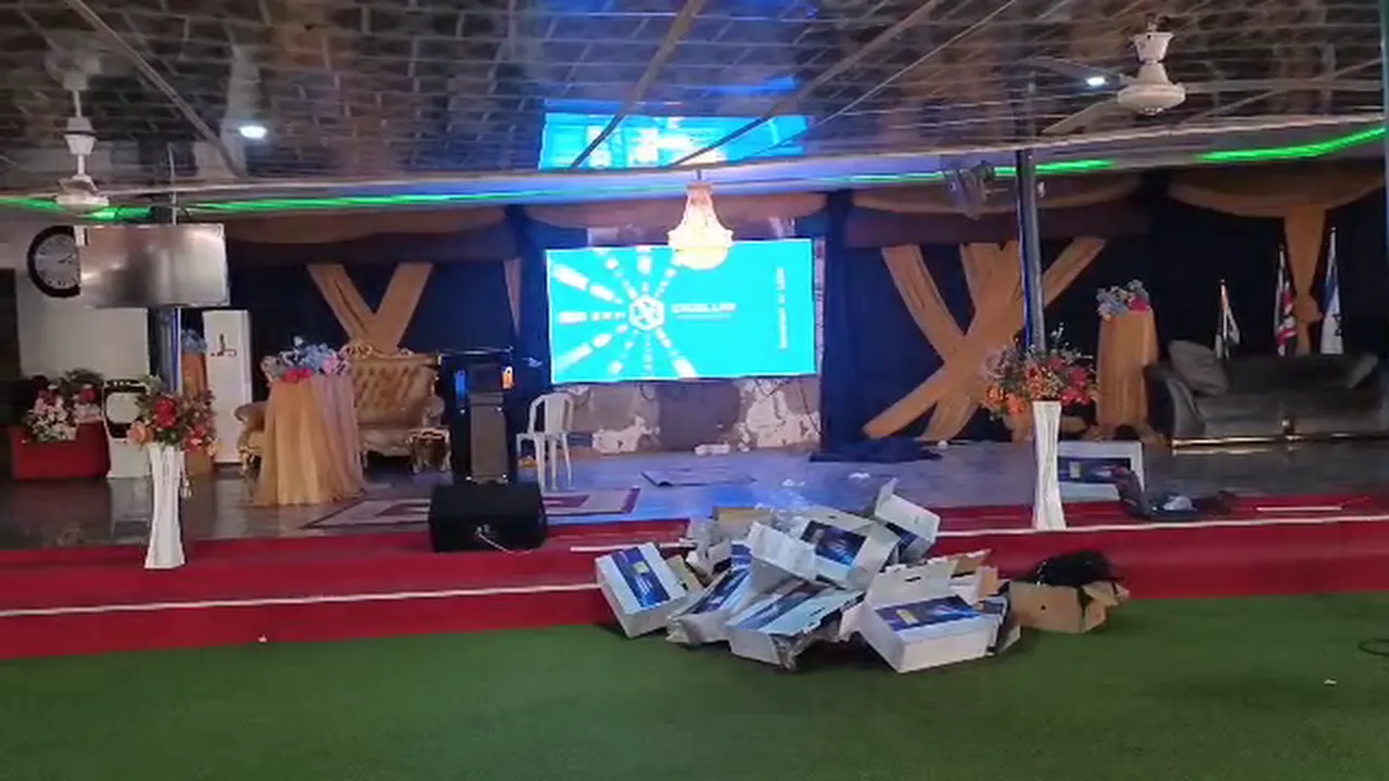 Ehonor Series P2.5 church LED screen during commissioning in Abuja, Nigeria, packaging boxes still on the floor