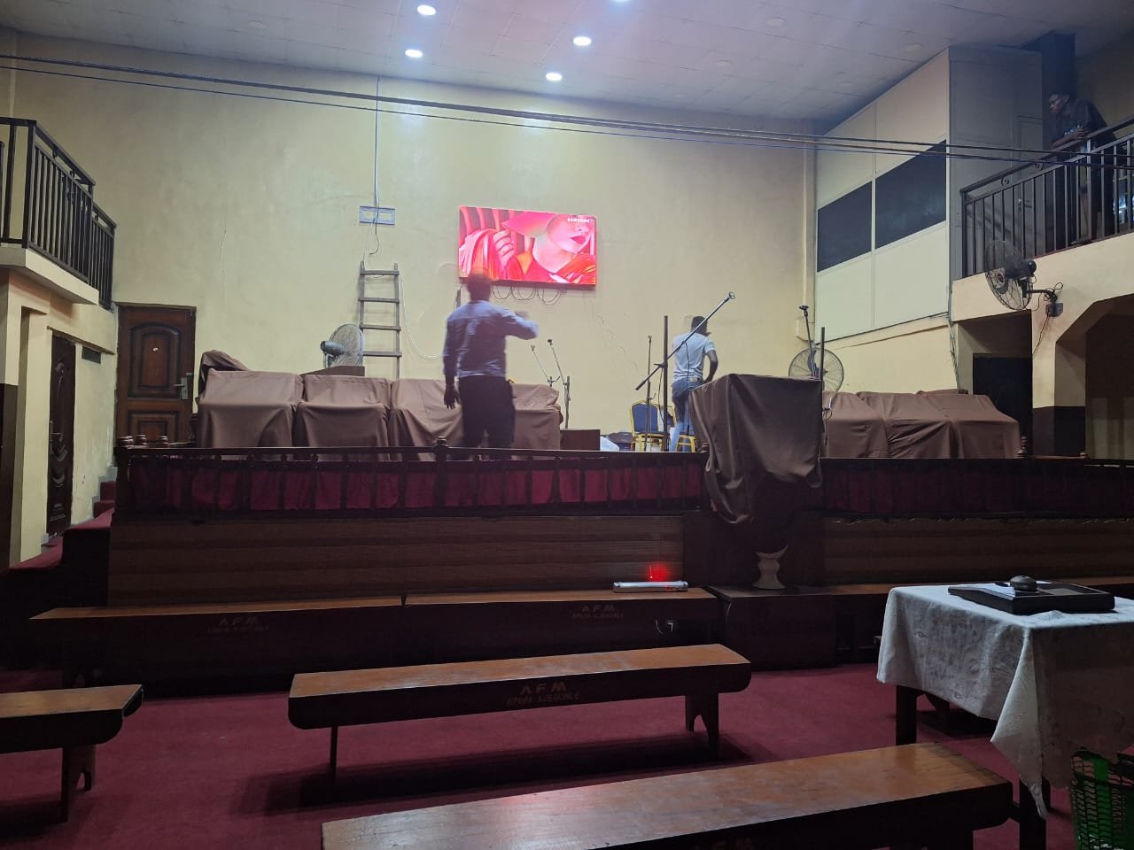 Photo from the project site: the 1.92 x 0.96 m Ehonor P2.5 church LED screen playing video content above the platform at the Apostolic Church in Apapa, Lagos