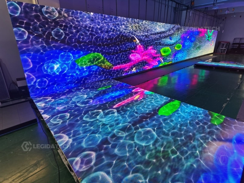 Built-in interactive effects running across the LED dance floor during an installation