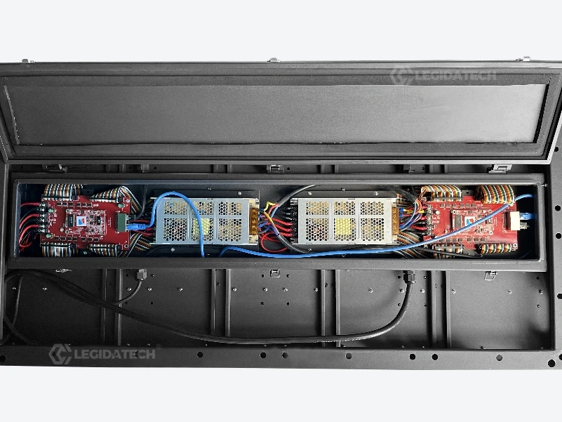 Rear view of the 500x1000mm floor cabinet showing the central power and signal cable channel and connector ports