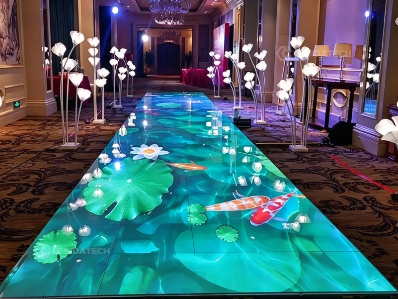 Guests at a banquet reception walking on a 500x1000mm LED floor tile screen with koi pond content