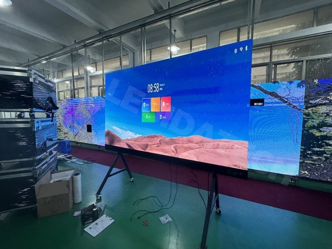 P2.5 all-in-one LED display on a mobile stand in the LEGIDATECH workshop