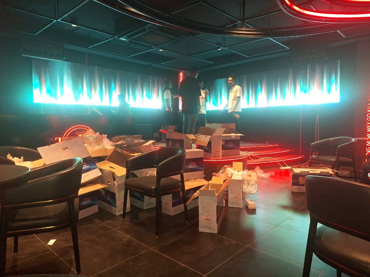 Photo from the project site: the twin Ehonor P2.5 LED screens above the club floor playing VJ visuals at the Toppest nightclub installation in Lagos